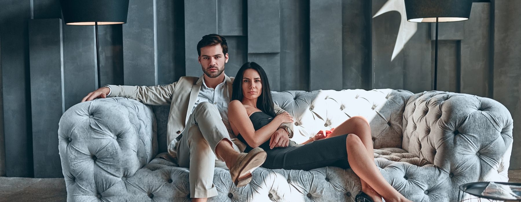 a man and a woman sitting on a couch