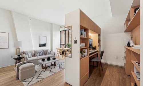 Relax and unwind in stylish living spaces expandable desk with living room, couch and windows
