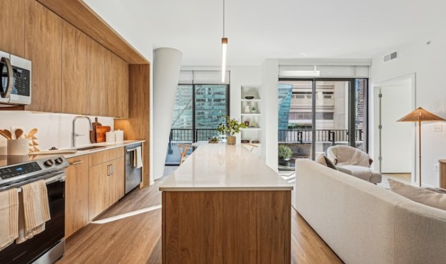 Settle into Comfort at 4909 Auburn Kitchen with dining room, living room and open to the bedroom